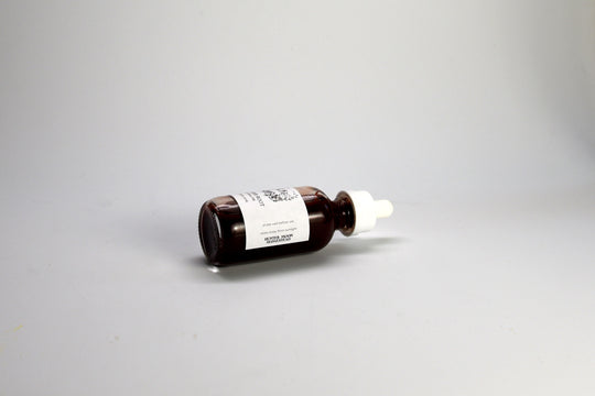 Brown glass dropper bottle of Madder root sumi ink