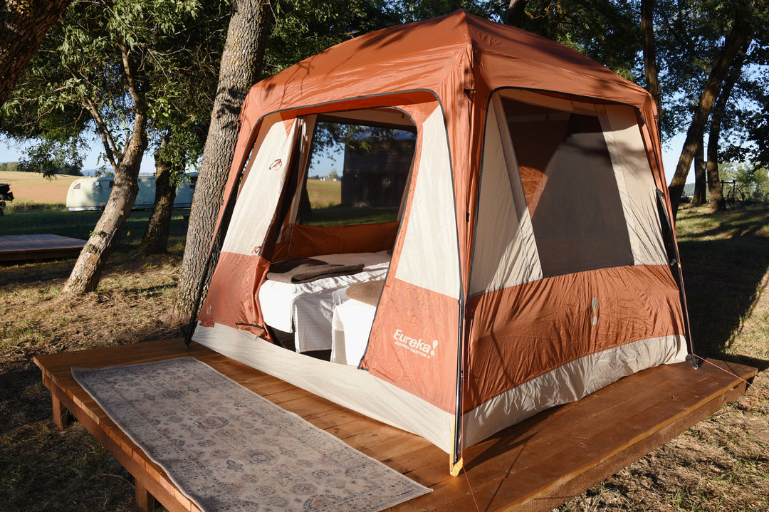 Tent platform with luxury cots at Hunter Moon Homestead