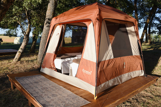 Tent platform with luxury cots at Hunter Moon Homestead