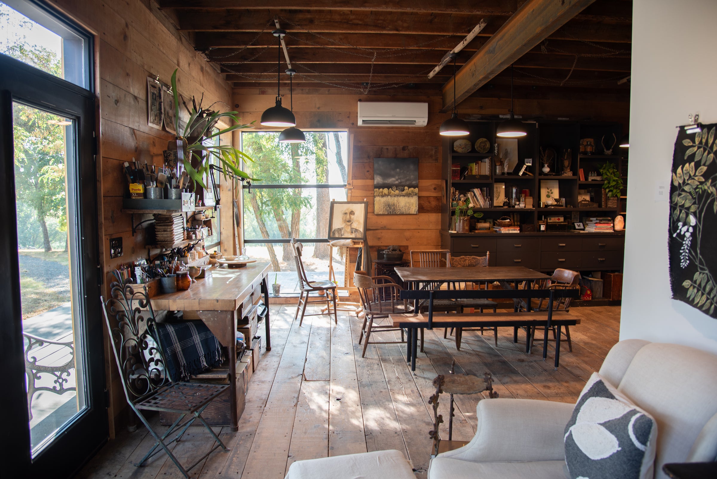 In the studio at the bee house, wood floors and full length windows to take in the view