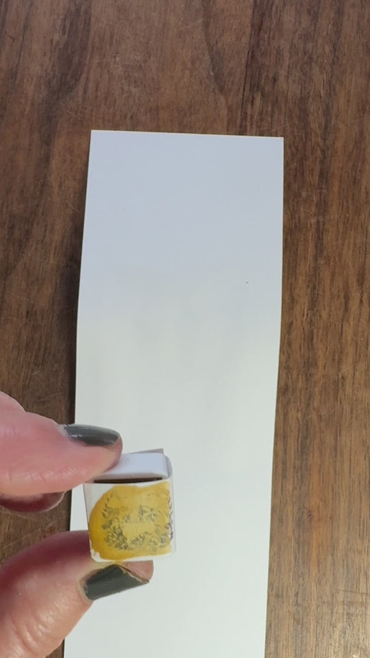 Yellow ochre watercolor paint